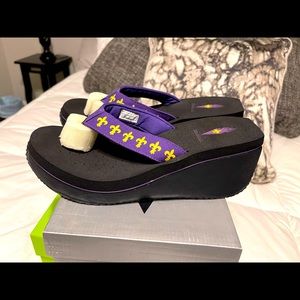 Brand new in original box purple Fleur de Lis Volatile size 10